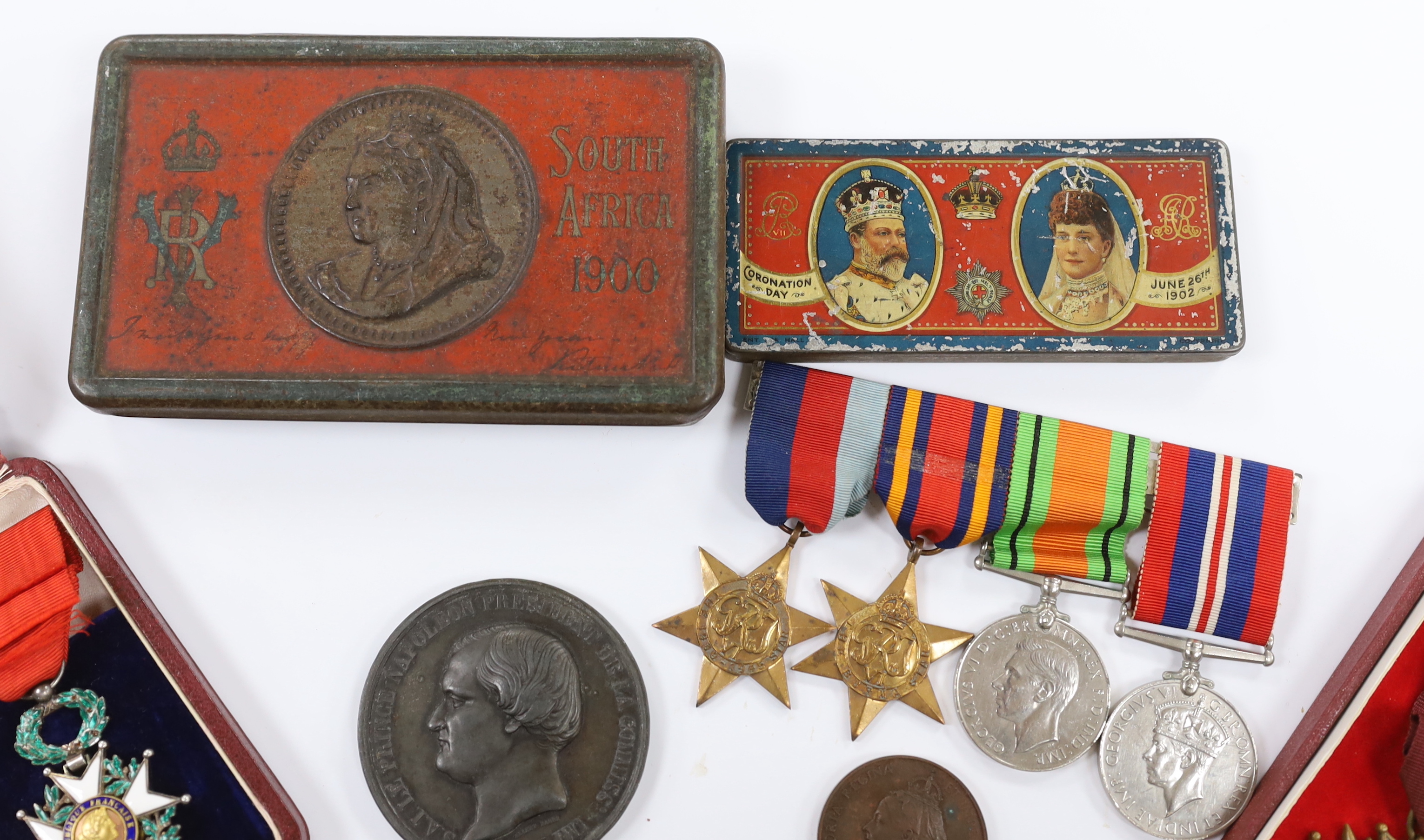A WWII medal group comprising The Burma Star, The 1939-1945 Star, The Defence medal and The War medal, a cased 1870 Republique Francaise medal, a Victoria Golden Jubilee medallion, an 1855 Napoleon medallion, a Polish Cr